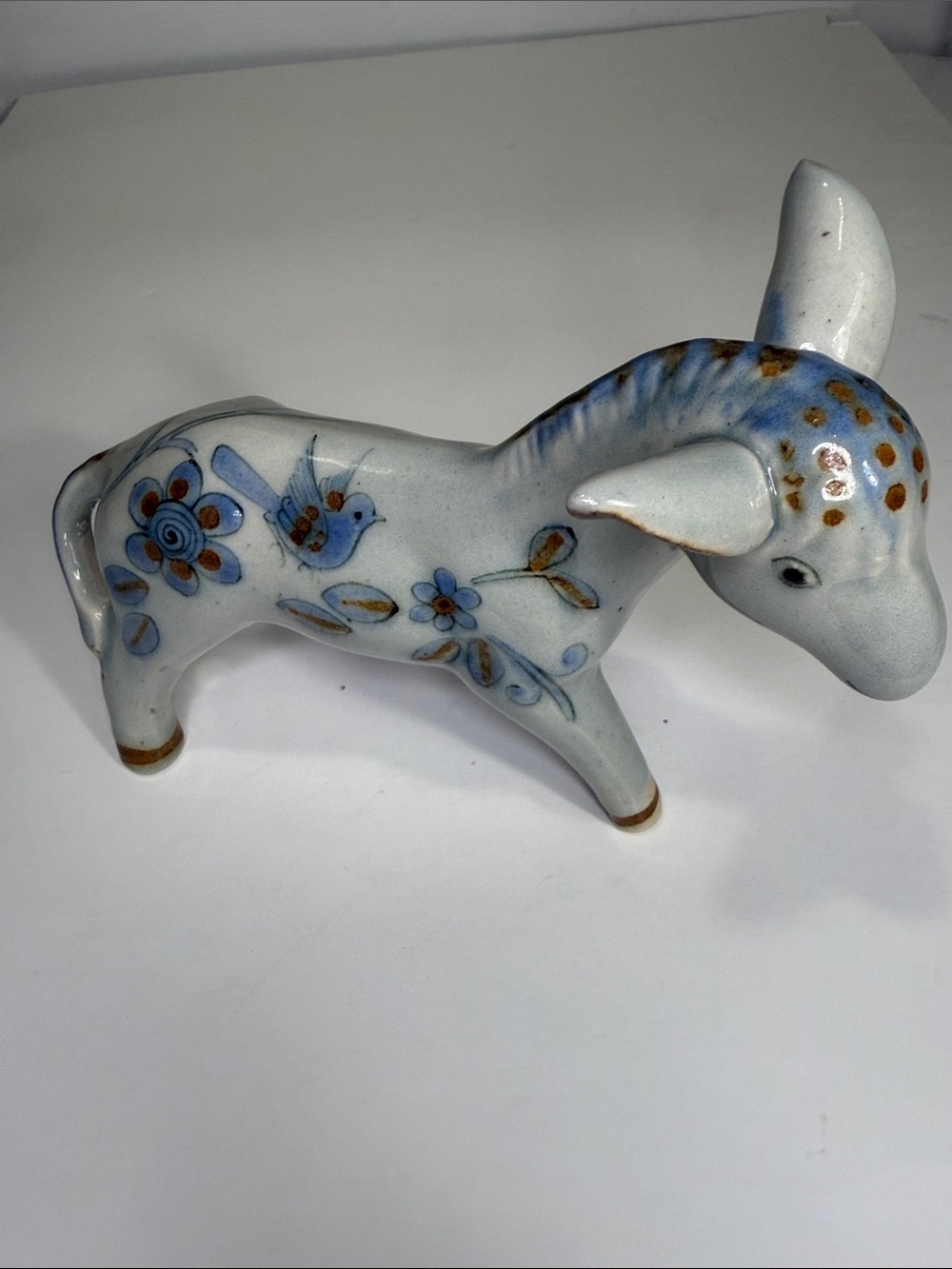 Hand-Painted Ceramic Animal Figurine in Blue Floral Motif
